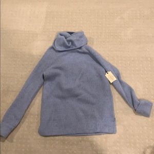 Turtleneck sweater. Light blue